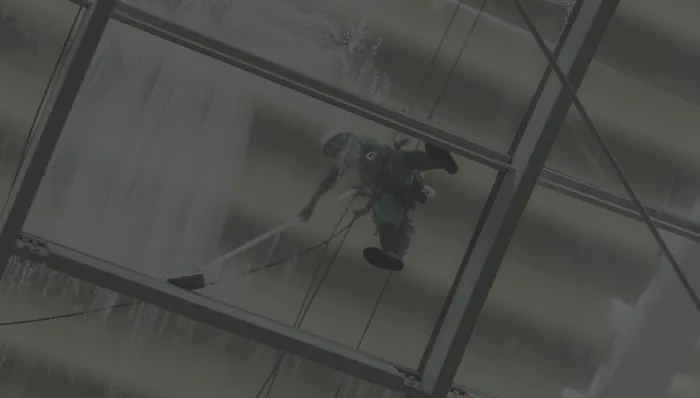 Cleaning the glass exterior of a commercial building