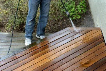Pressure washing and restoring a wooden deck