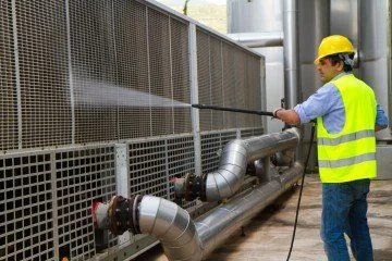 Commercial pressure washing of industrial equipment