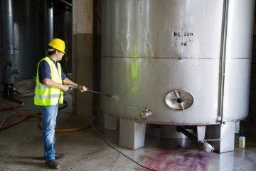 Pressure washing stainless steel commercial tanks